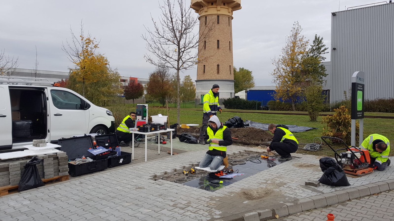 Installing solar paving tiles at Prologis Park Budapest-Harbor, Hungary