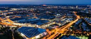 presence_markets_munich_web.jpg München von oben mit Blick auf die BMW World