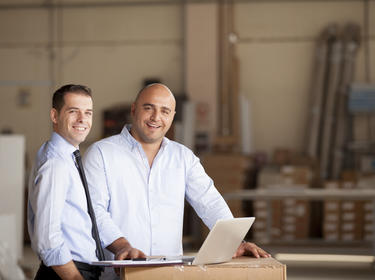 Two people working on a proposal